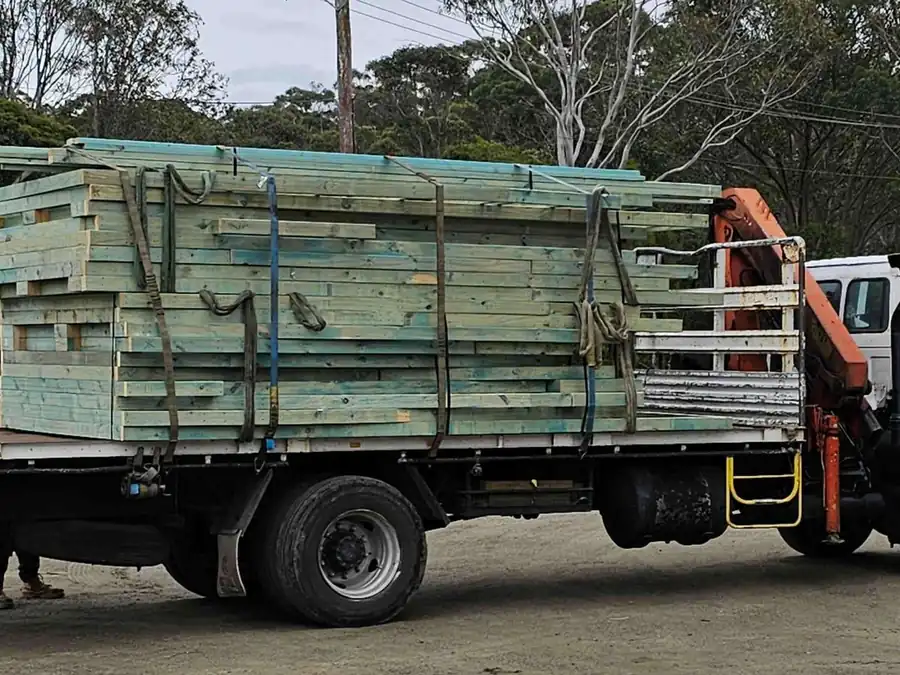 Allbuild delivery truck loaded with timber frames